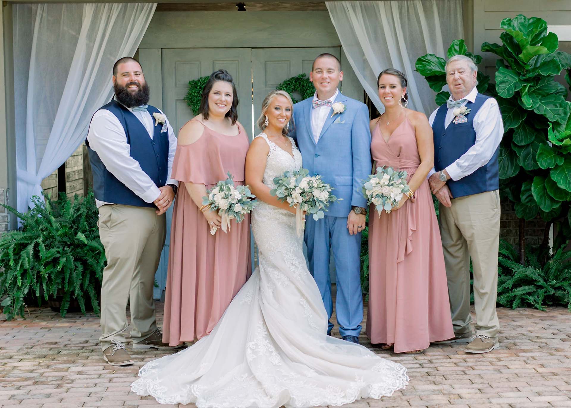 Masters Stables wedding venue barn-10 bride groom family